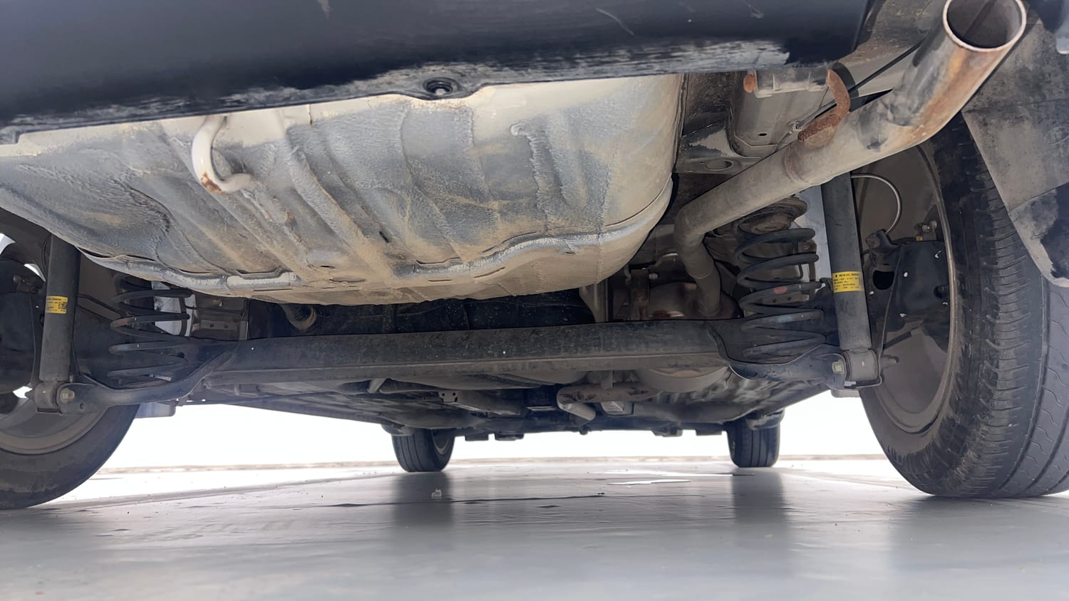 Used 2023 Honda Amaze VX CVT 1.2 Petrol Petrol Automatic extra REAR UNDERBODY VIEW (TAKEN FROM REAR)