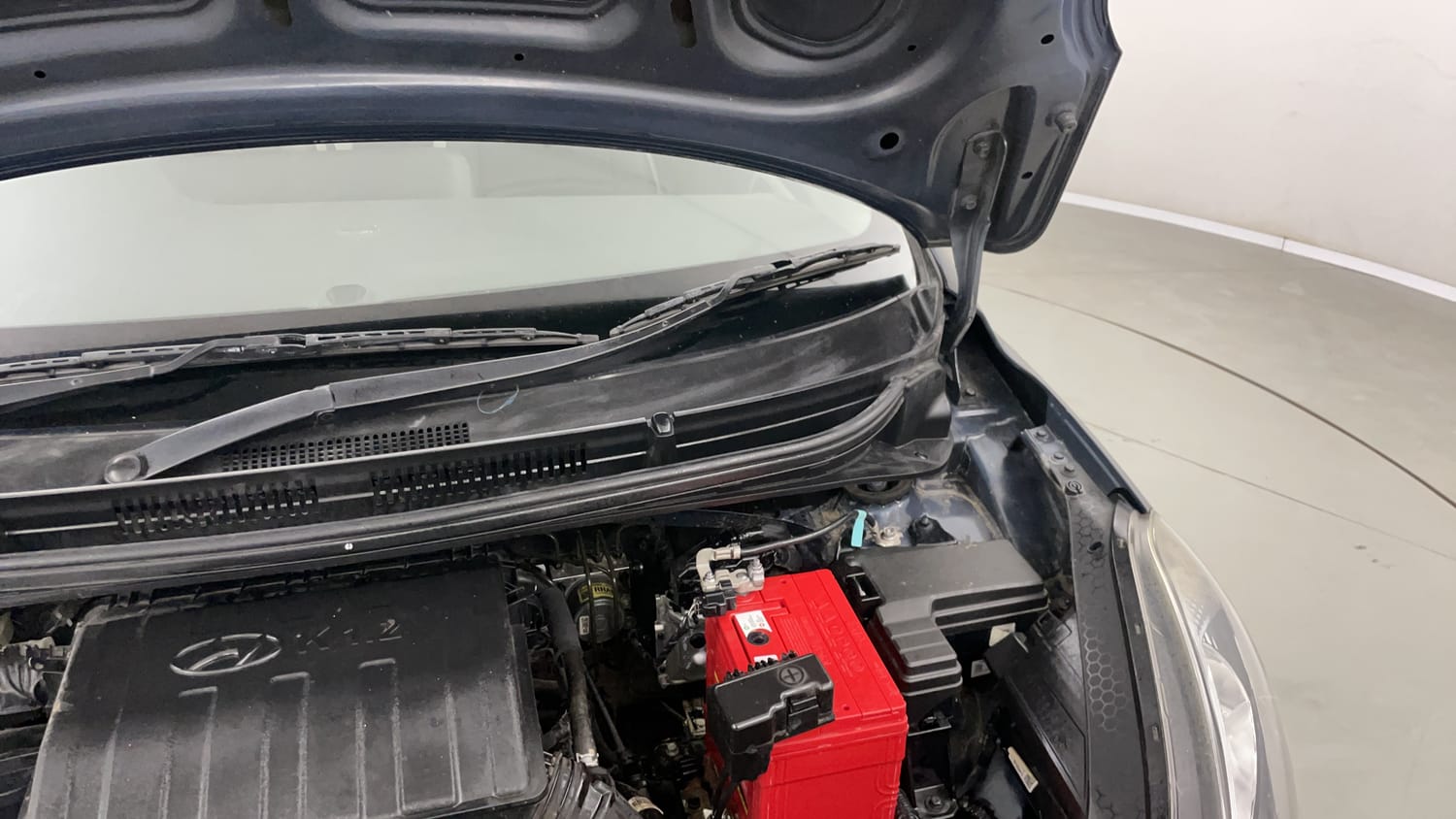 Used 2022 Hyundai Grand i10 Nios Magna 1.2 Kappa VTVT Petrol Manual engine ENGINE LEFT SIDE HINGE & APRON VIEW