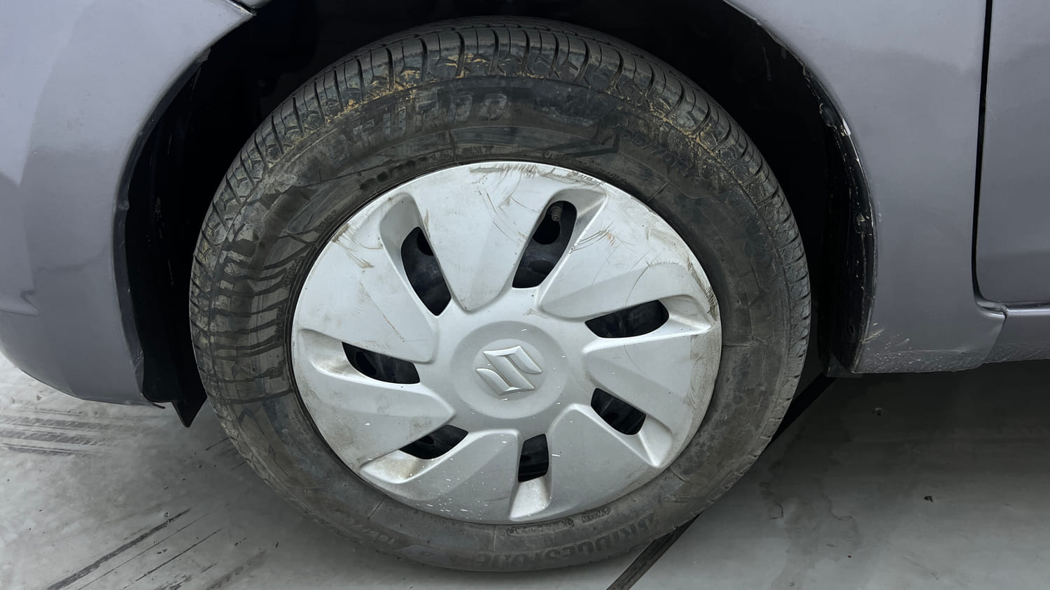 Used 2017 Maruti Suzuki Celerio VXi AMT Petrol Automatic tyres LEFT FRONT TYRE RIM VIEW