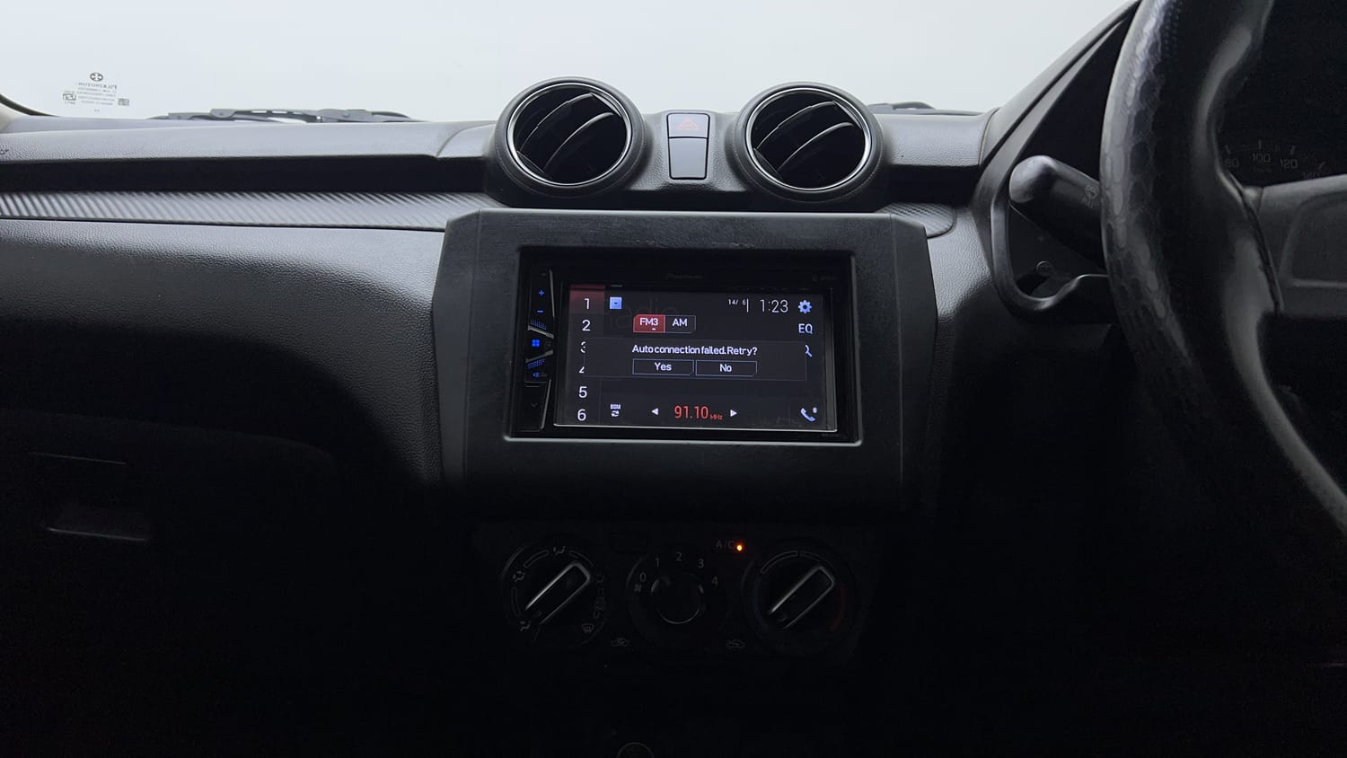Used 2021 Maruti Suzuki Swift LXi Petrol Manual interior MUSIC SYSTEM & AC CONTROL VIEW
