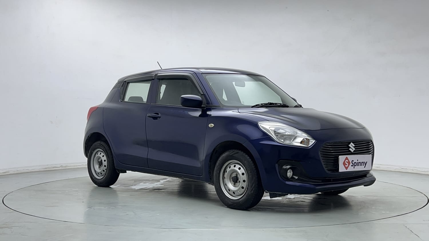 Used 2021 Maruti Suzuki Swift LXi Petrol Manual exterior RIGHT FRONT CORNER VIEW