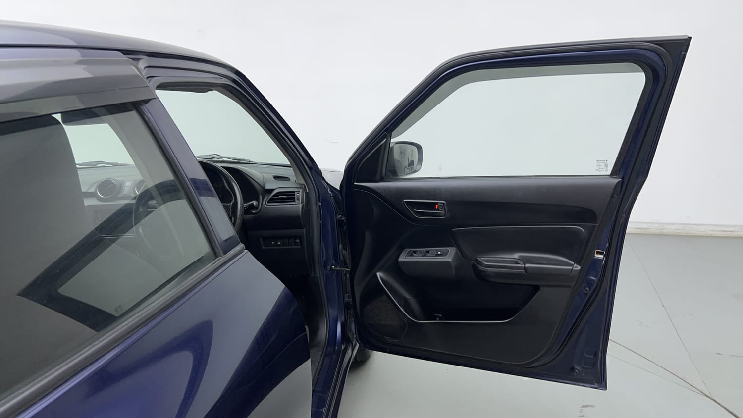 Used 2021 Maruti Suzuki Swift LXi Petrol Manual interior RIGHT FRONT DOOR OPEN VIEW