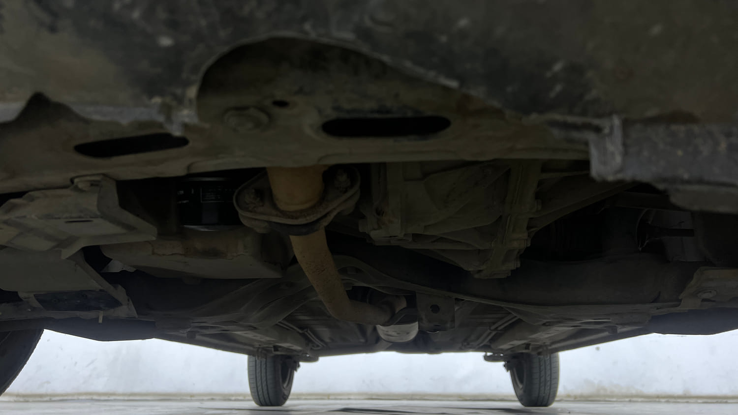 Used 2017 Maruti Suzuki Celerio VXi AMT Petrol Automatic extra FRONT LEFT UNDERBODY VIEW