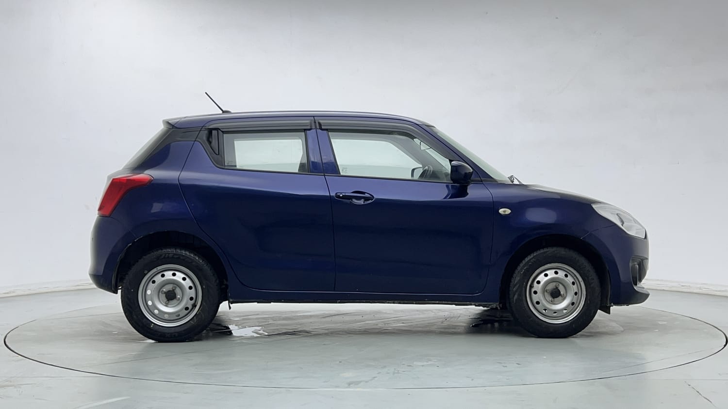 Used 2021 Maruti Suzuki Swift LXi Petrol Manual exterior RIGHT SIDE VIEW