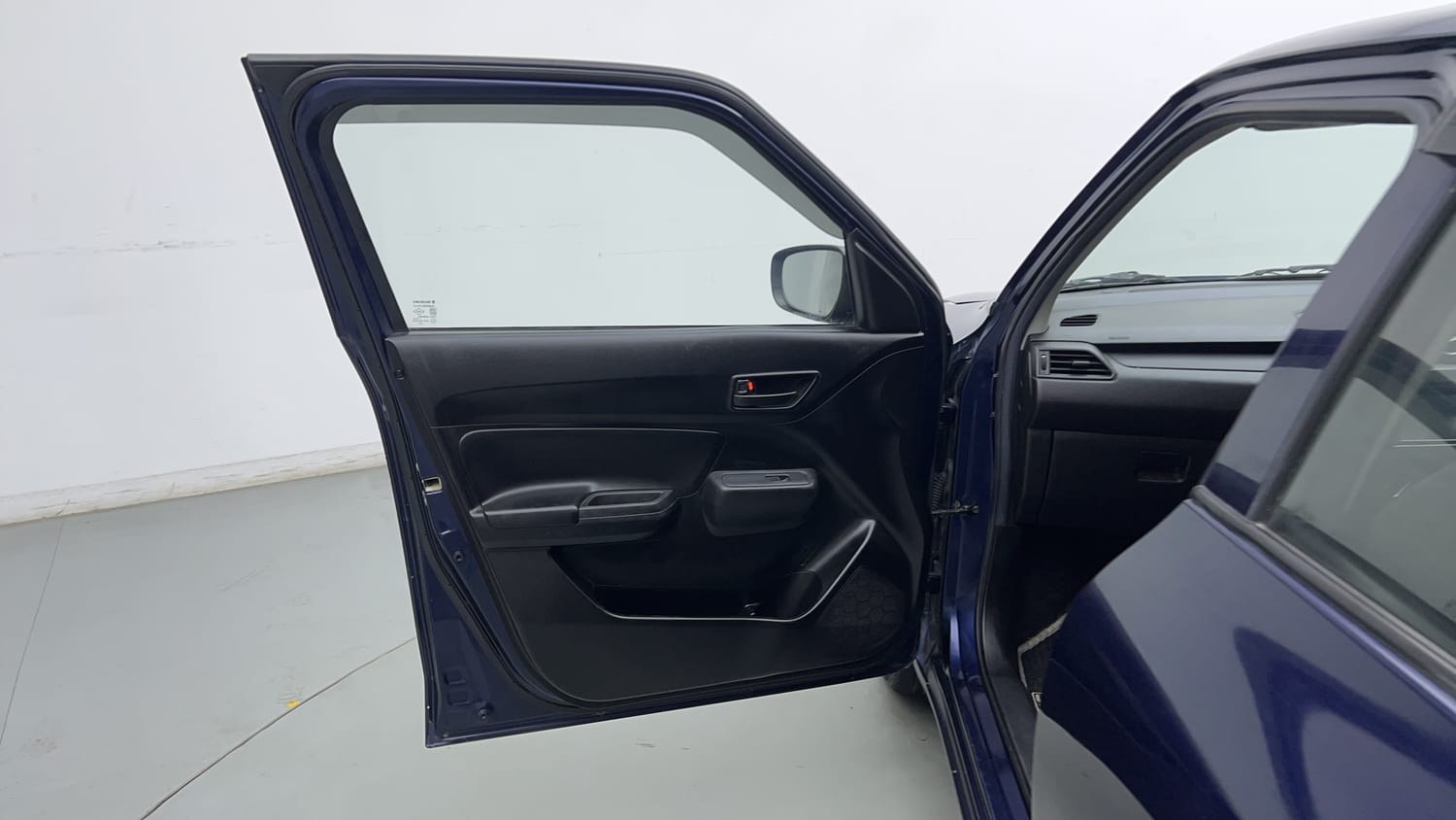 Used 2021 Maruti Suzuki Swift LXi Petrol Manual interior LEFT FRONT DOOR OPEN VIEW