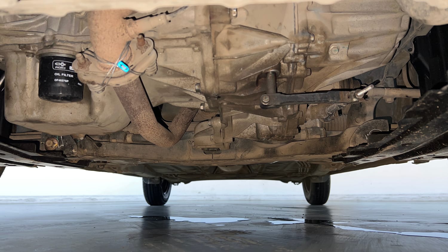 Used 2021 Maruti Suzuki Swift LXi Petrol Manual extra FRONT LEFT UNDERBODY VIEW