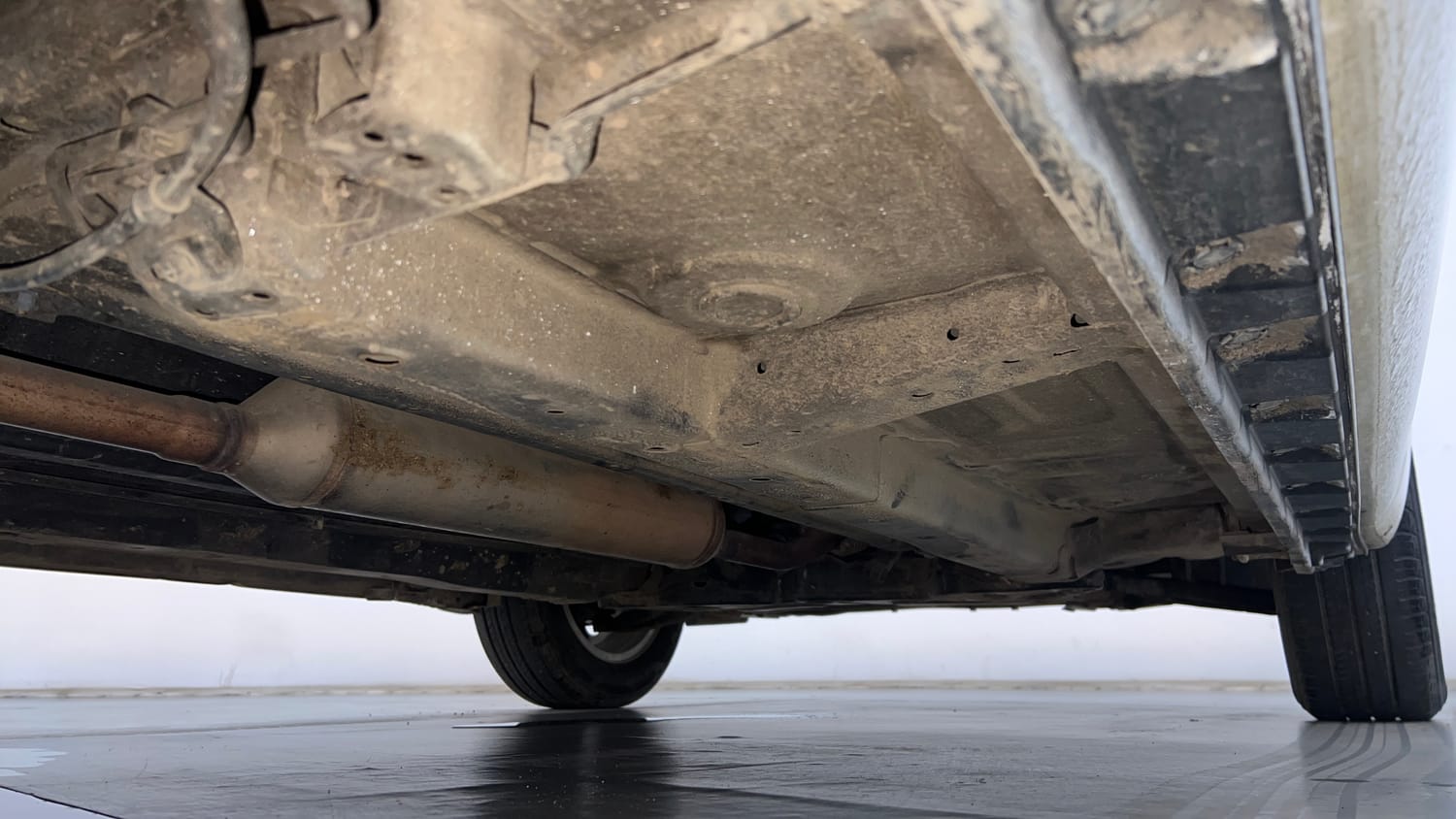 Used 2012 Maruti Suzuki Swift Dzire ZXI Petrol Manual extra REAR RIGHT UNDERBODY VIEW