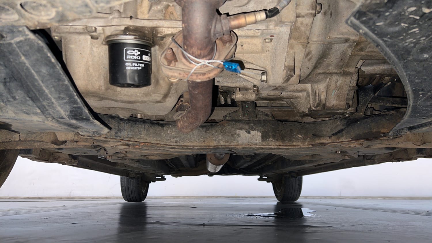 Used 2012 Maruti Suzuki Swift Dzire ZXI Petrol Manual extra FRONT LEFT UNDERBODY VIEW
