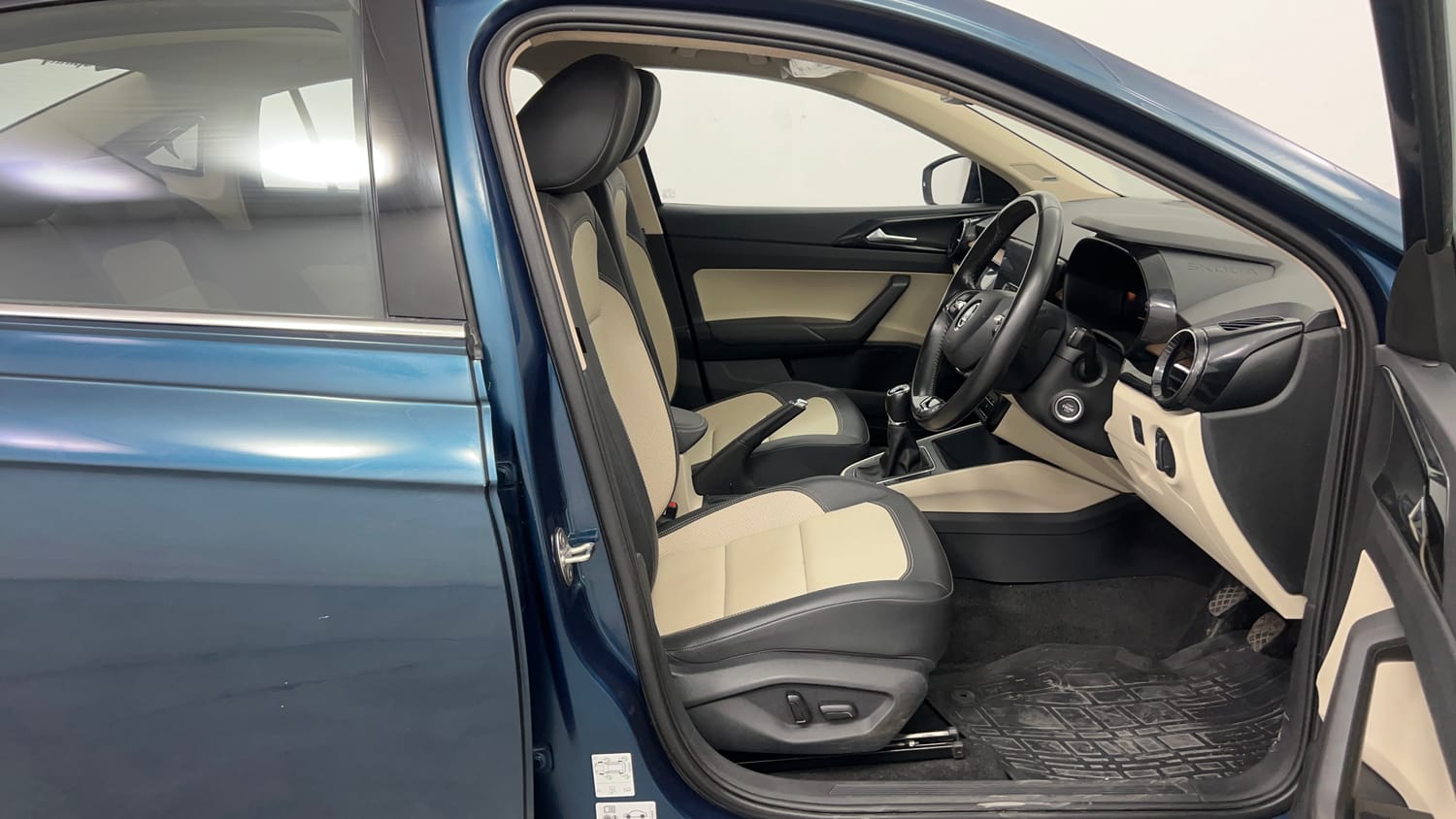 Used 2025 Skoda Slavia Style 1.0L TSI MT Petrol Manual interior RIGHT SIDE FRONT DOOR CABIN VIEW