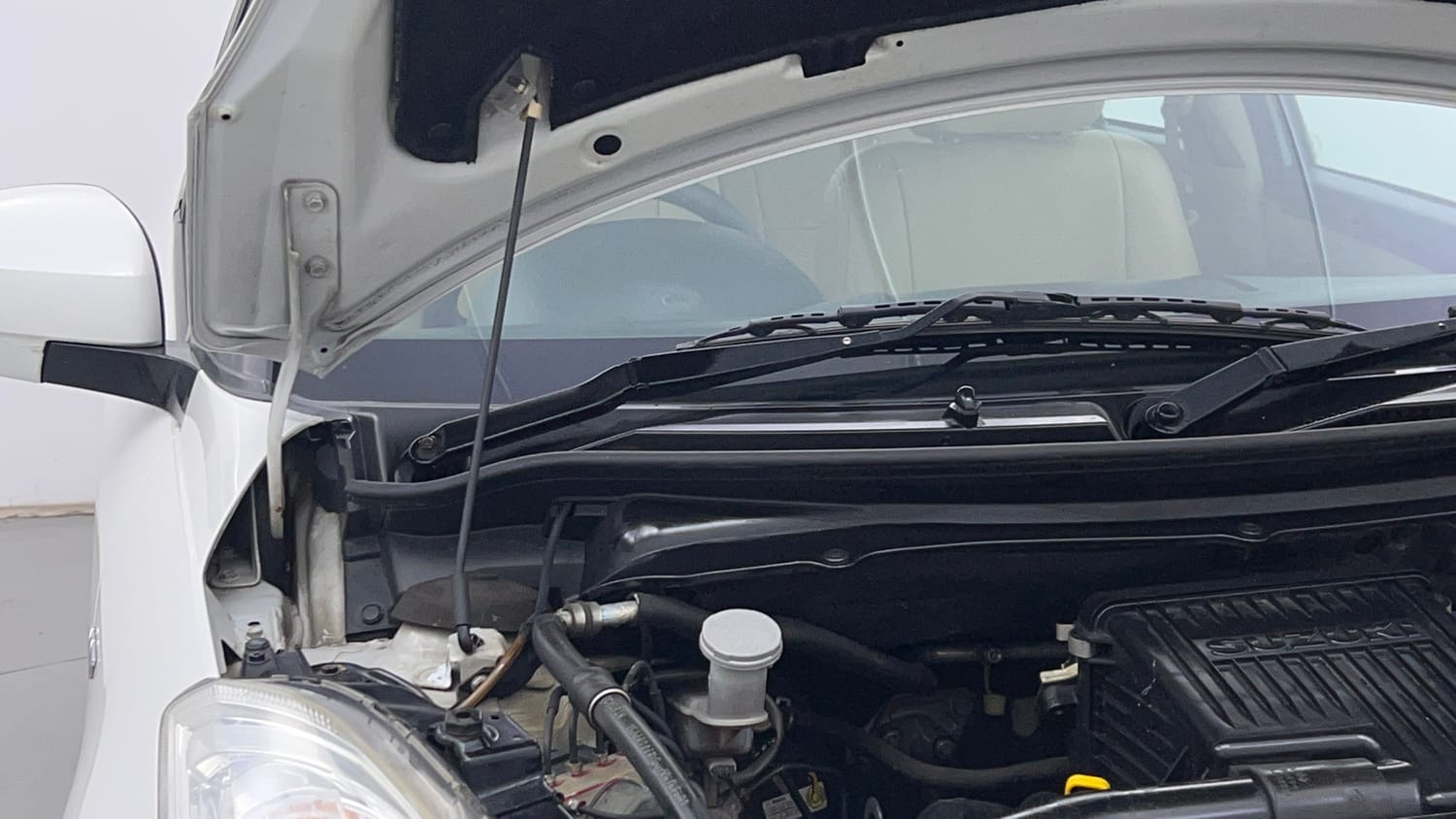 Used 2012 Maruti Suzuki Swift Dzire ZXI Petrol Manual engine ENGINE RIGHT SIDE HINGE & APRON VIEW