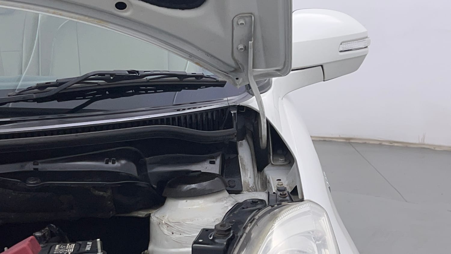 Used 2012 Maruti Suzuki Swift Dzire ZXI Petrol Manual engine ENGINE LEFT SIDE HINGE & APRON VIEW