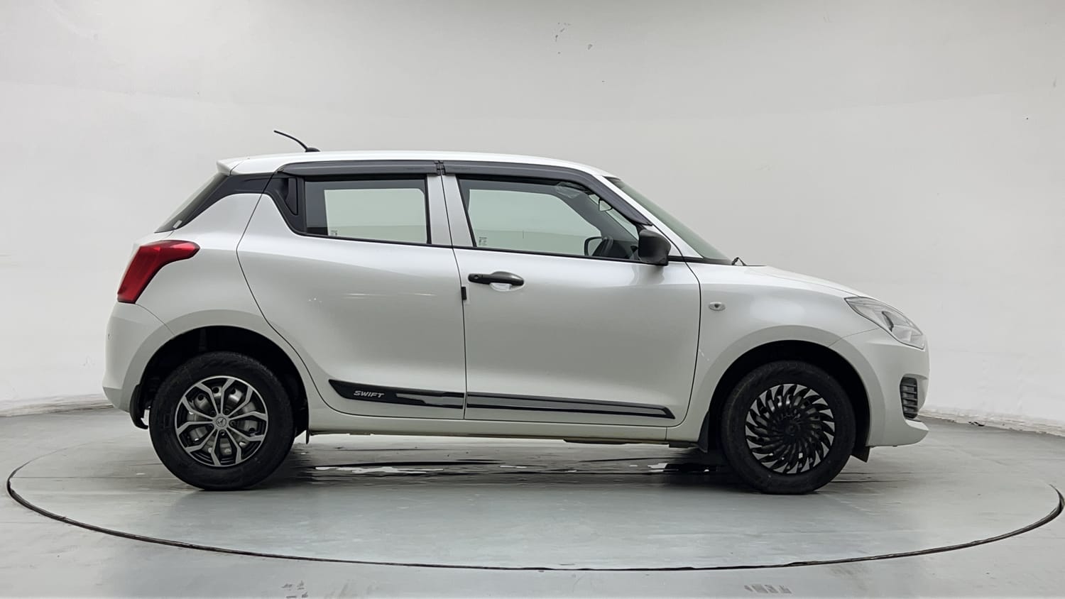 Used 2023 Maruti Suzuki Swift LXi Petrol Manual exterior RIGHT SIDE VIEW