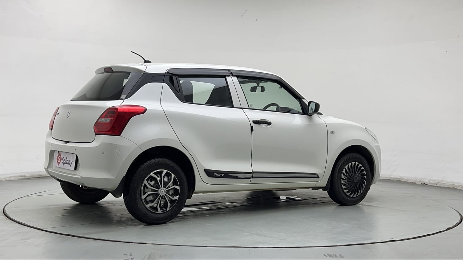 Used 2023 Maruti Suzuki Swift LXi Petrol Manual exterior RIGHT REAR CORNER VIEW