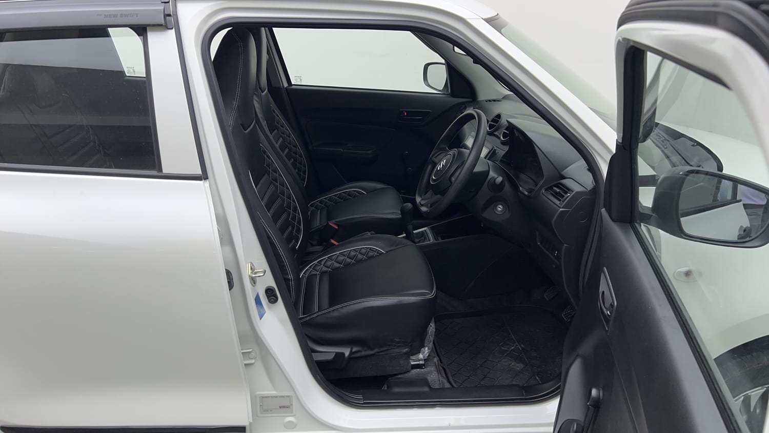 Used 2023 Maruti Suzuki Swift LXi Petrol Manual interior RIGHT SIDE FRONT DOOR CABIN VIEW