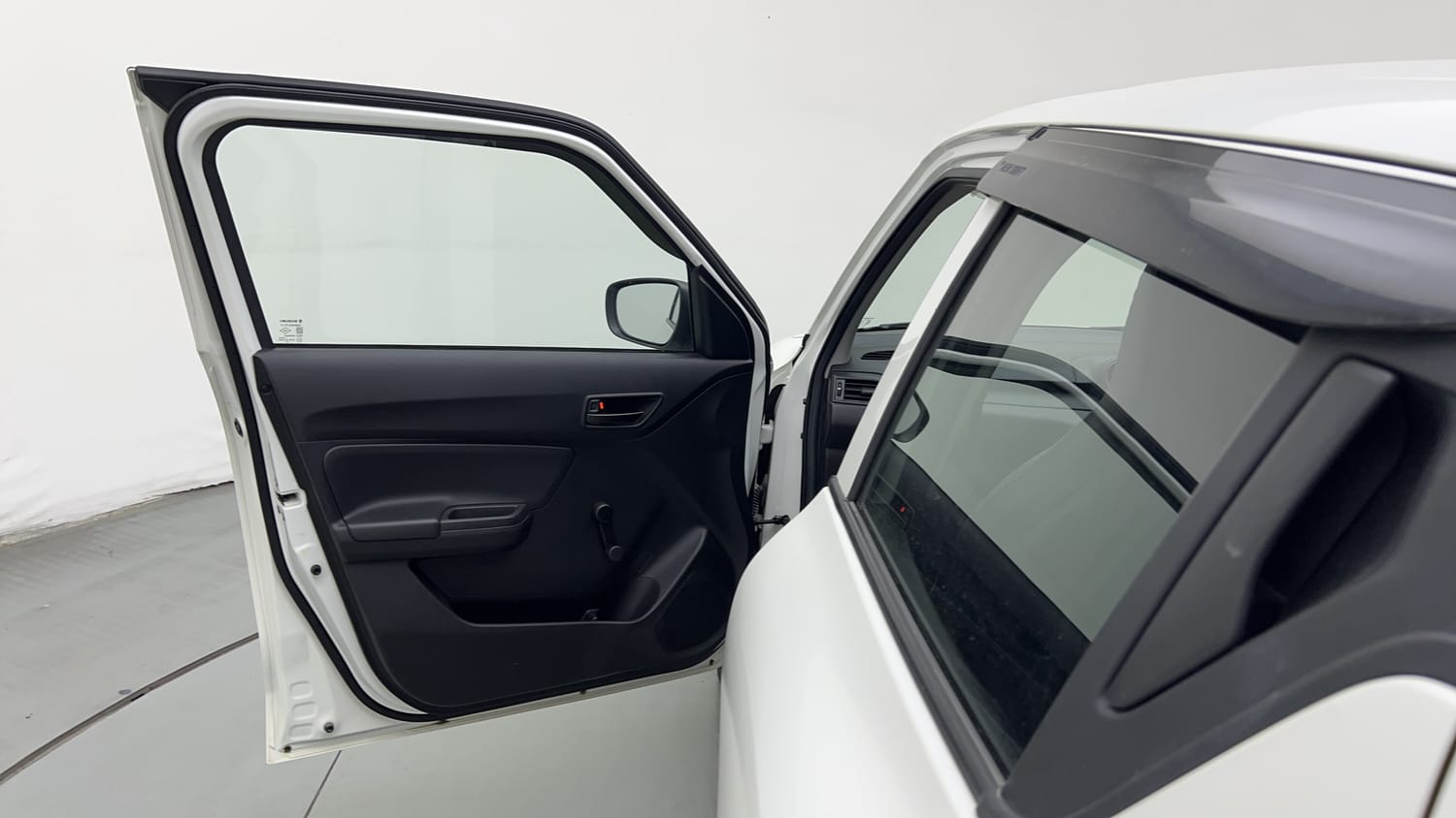 Used 2023 Maruti Suzuki Swift LXi Petrol Manual interior LEFT FRONT DOOR OPEN VIEW