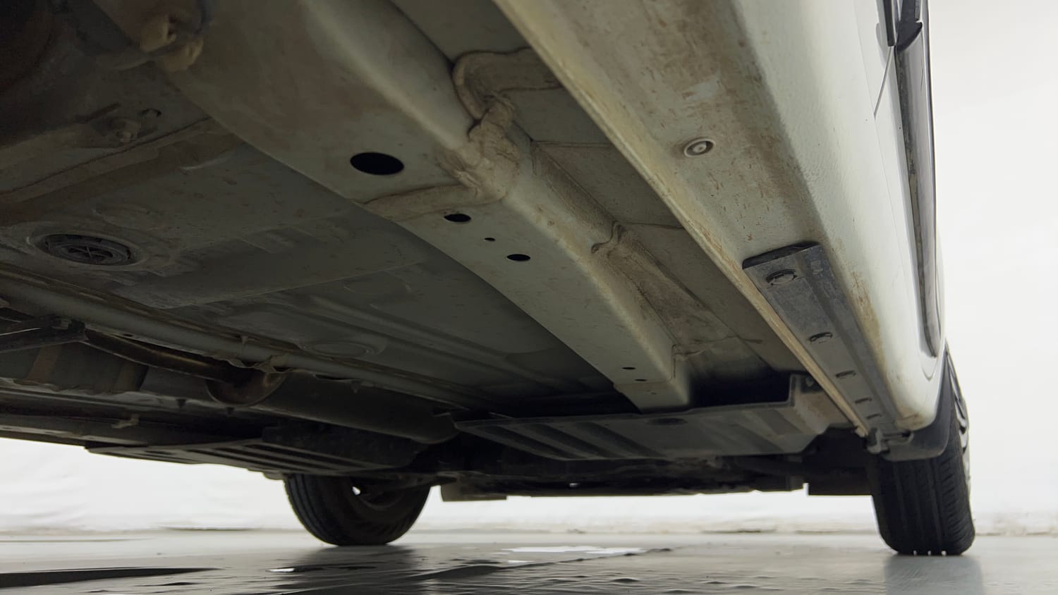 Used 2023 Maruti Suzuki Swift LXi Petrol Manual extra REAR RIGHT UNDERBODY VIEW