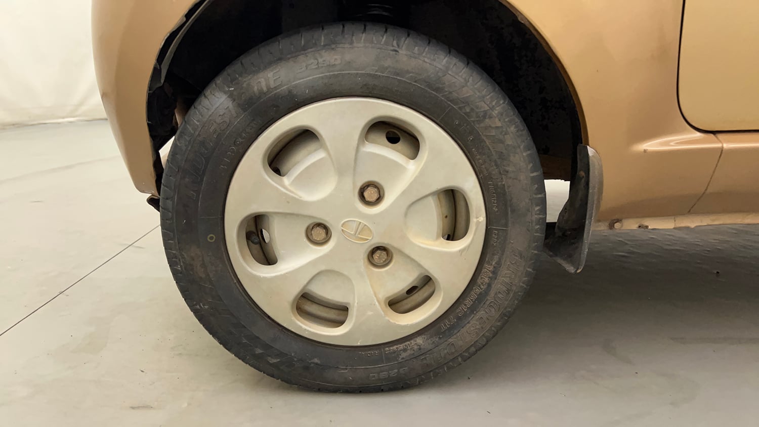 Used 2014 Tata Nano Twist XT Petrol Manual tyres LEFT FRONT TYRE RIM VIEW