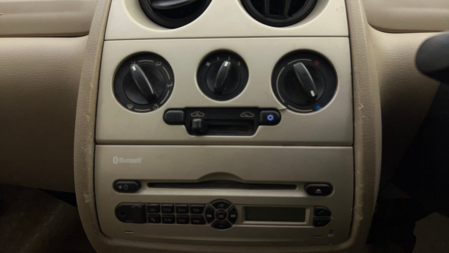 Used 2014 Tata Nano Twist XT Petrol Manual top_features Integrated (in-dash) music system
