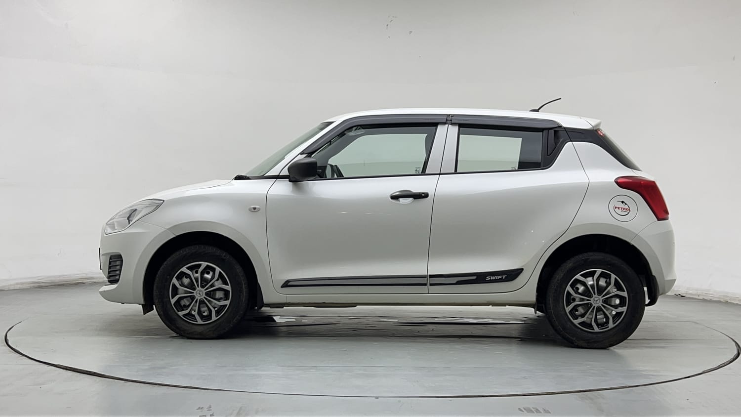 Used 2023 Maruti Suzuki Swift LXi Petrol Manual exterior LEFT SIDE VIEW