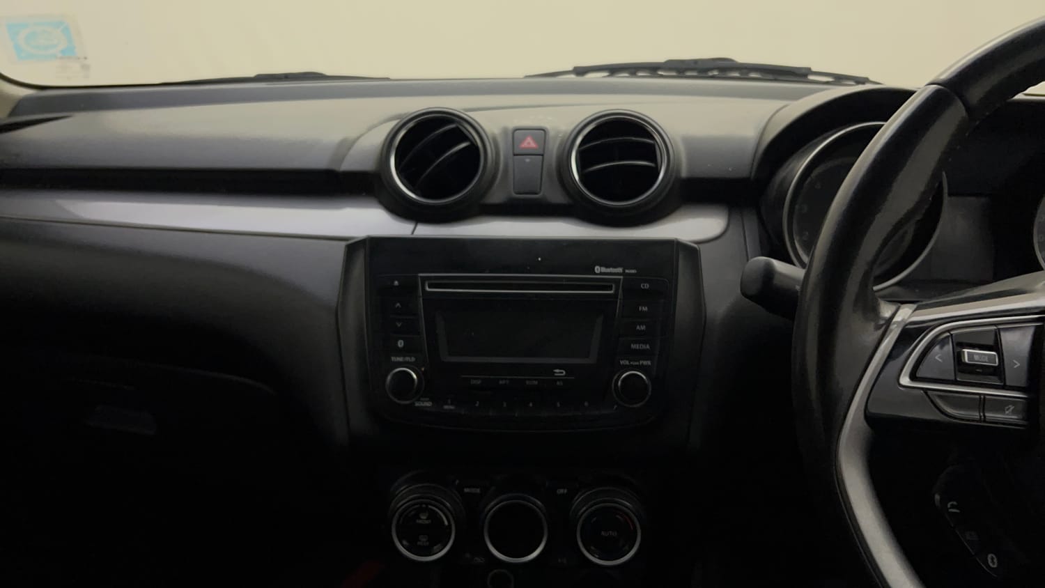 Used 2020 Maruti Suzuki Swift ZXi AMT Petrol Automatic top_features Integrated (in-dash) music system