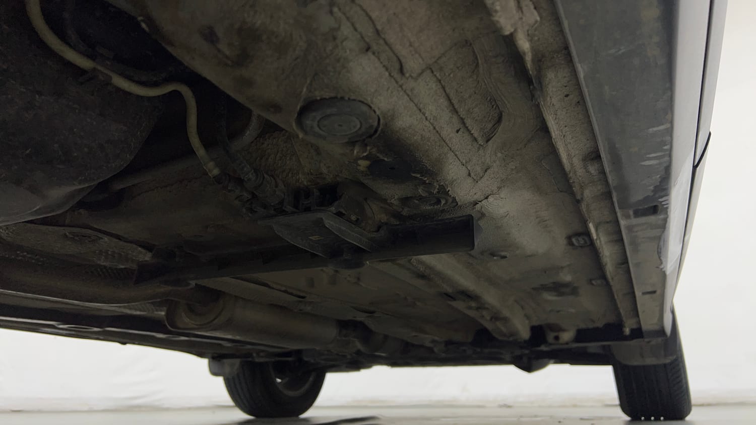 Used 2024 Volkswagen Taigun Highline 1.0 TSI MT Petrol Manual extra REAR RIGHT UNDERBODY VIEW