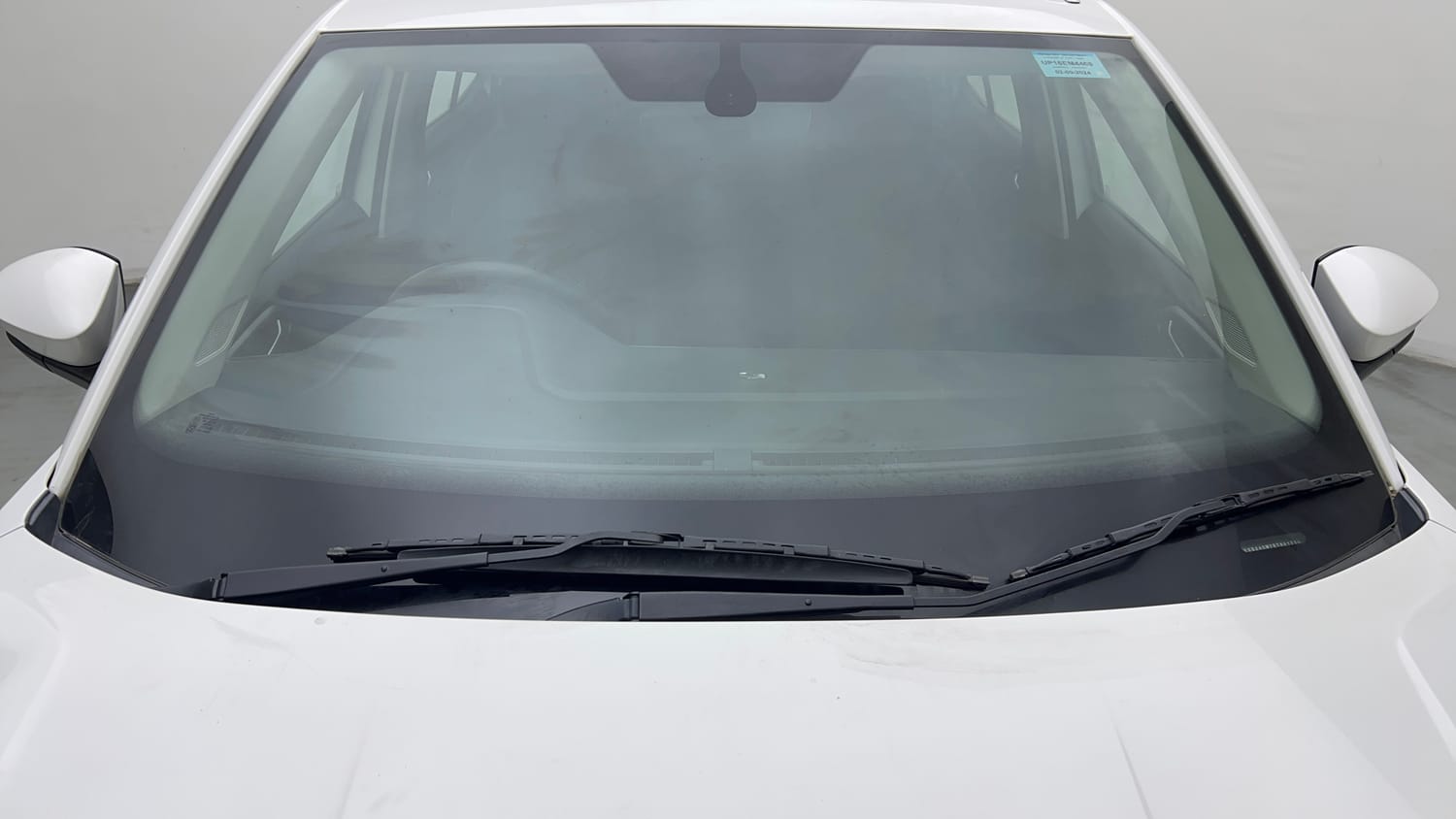 Used 2024 Volkswagen Taigun Highline 1.0 TSI MT Petrol Manual exterior FRONT WINDSHIELD VIEW