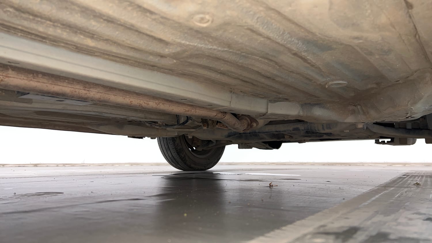 Used 2022 Honda Amaze S MT 1.2 Petrol Petrol Manual extra REAR RIGHT UNDERBODY VIEW