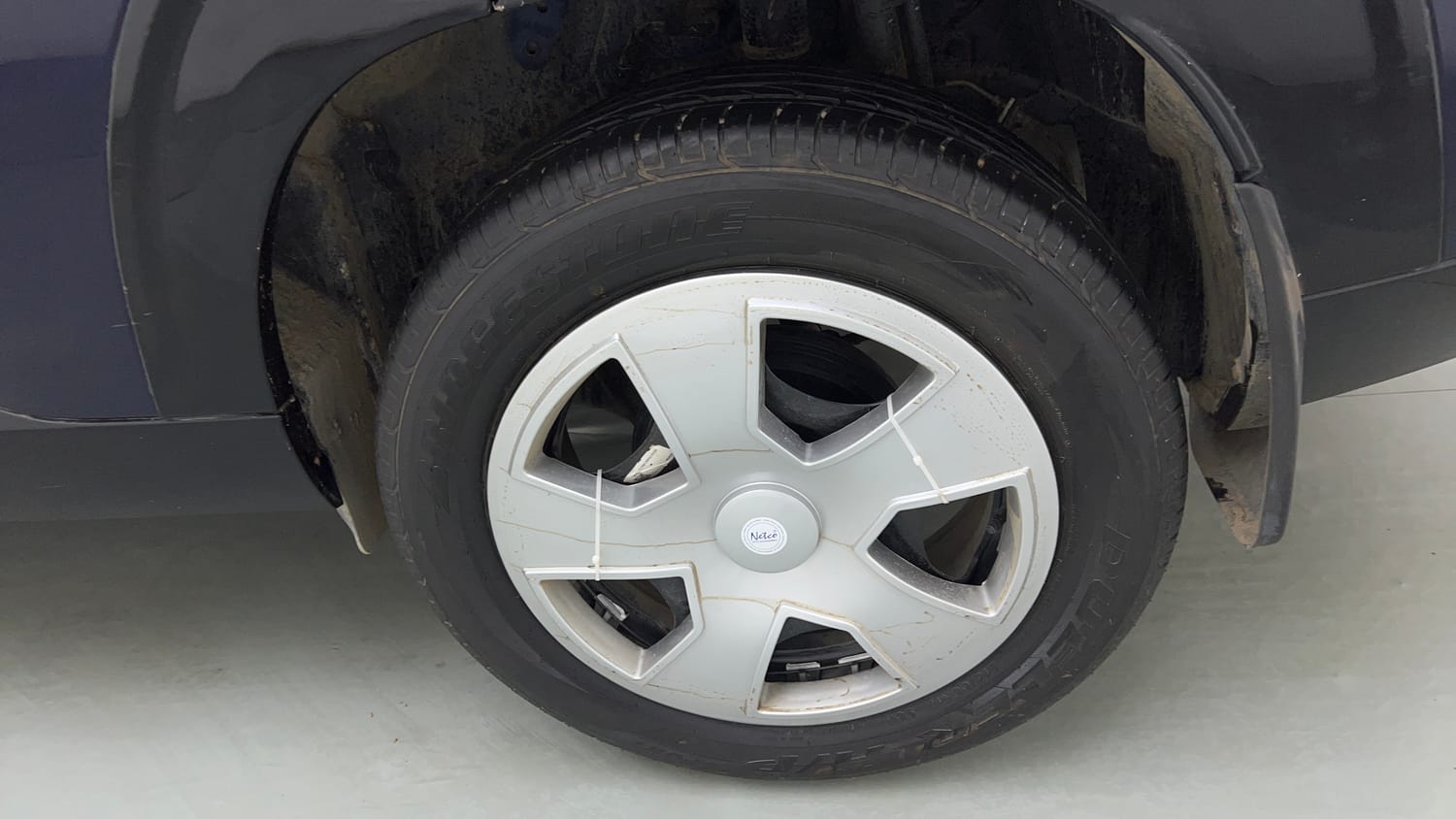 Used 2025 Tata Curvv Pure Plus S 1.2 Revotron Petrol 7DCA Petrol Automatic tyres LEFT REAR TYRE RIM VIEW