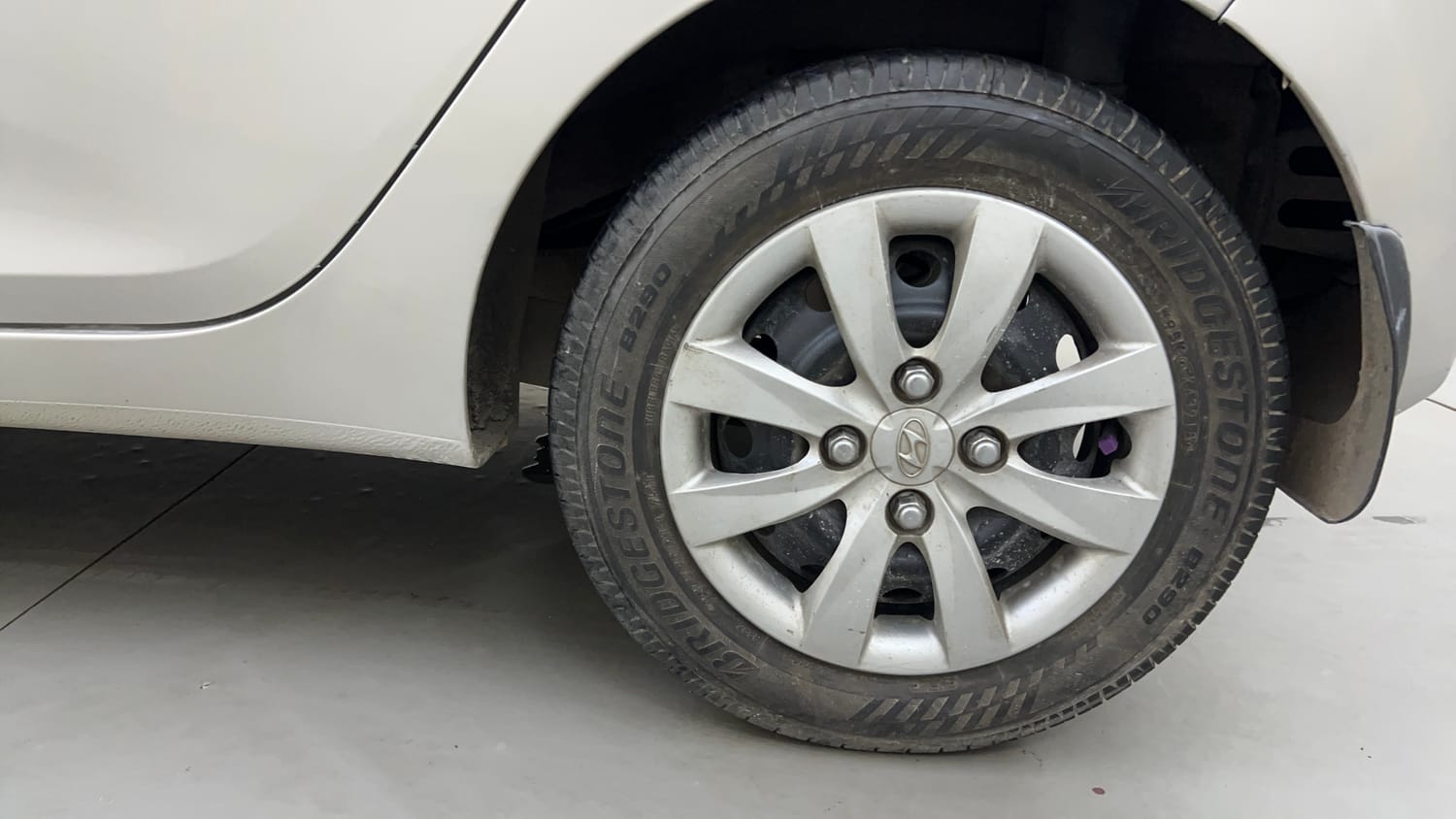 Used 2011 Hyundai Eon Sportz Petrol Manual tyres LEFT REAR TYRE RIM VIEW