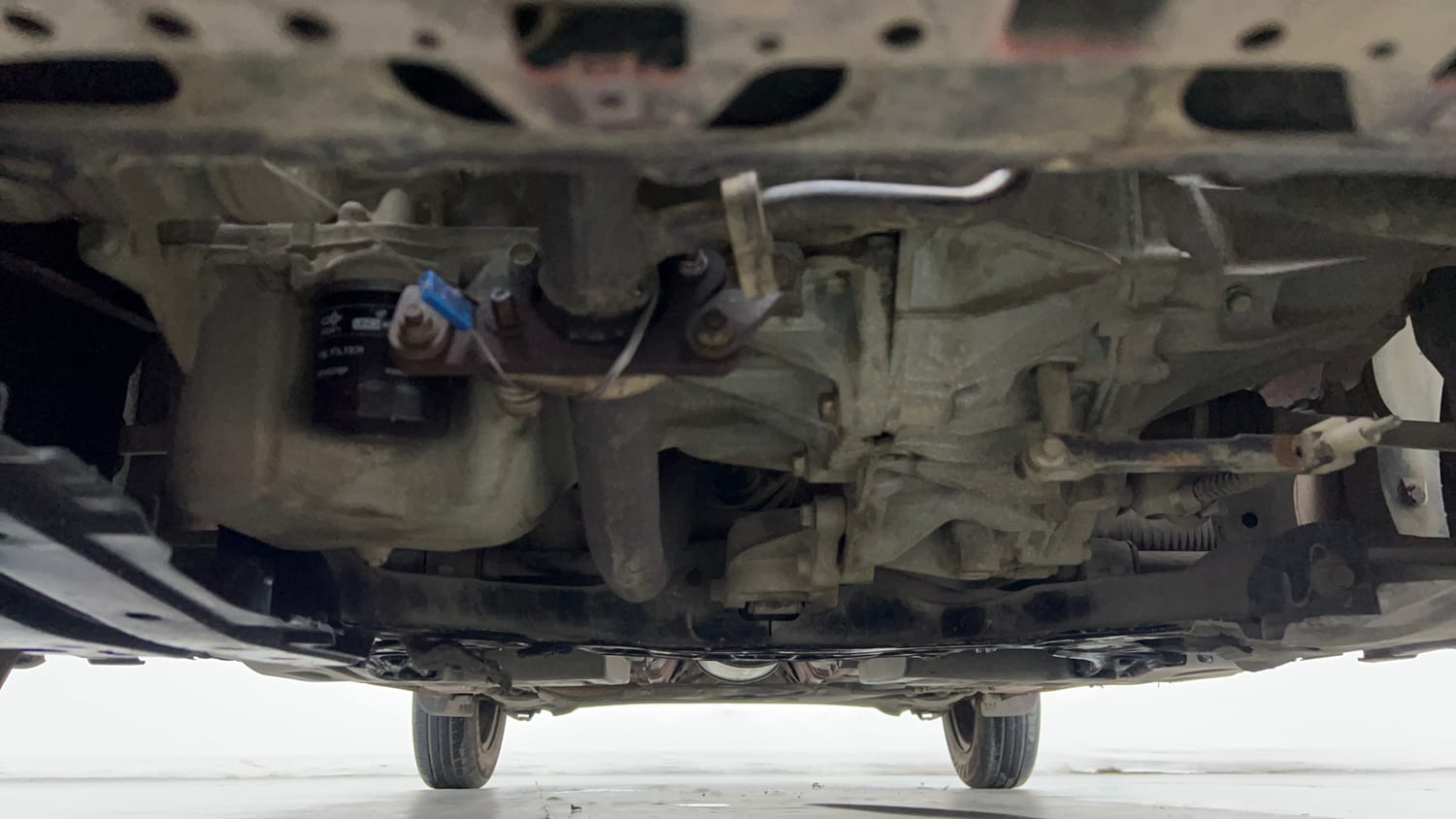 Used 2023 Maruti Suzuki Swift VXi Petrol Manual extra FRONT LEFT UNDERBODY VIEW