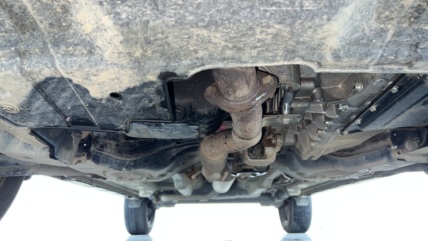 Used 2025 Tata Curvv Pure Plus S 1.2 Revotron Petrol 7DCA Petrol Automatic extra FRONT LEFT UNDERBODY VIEW
