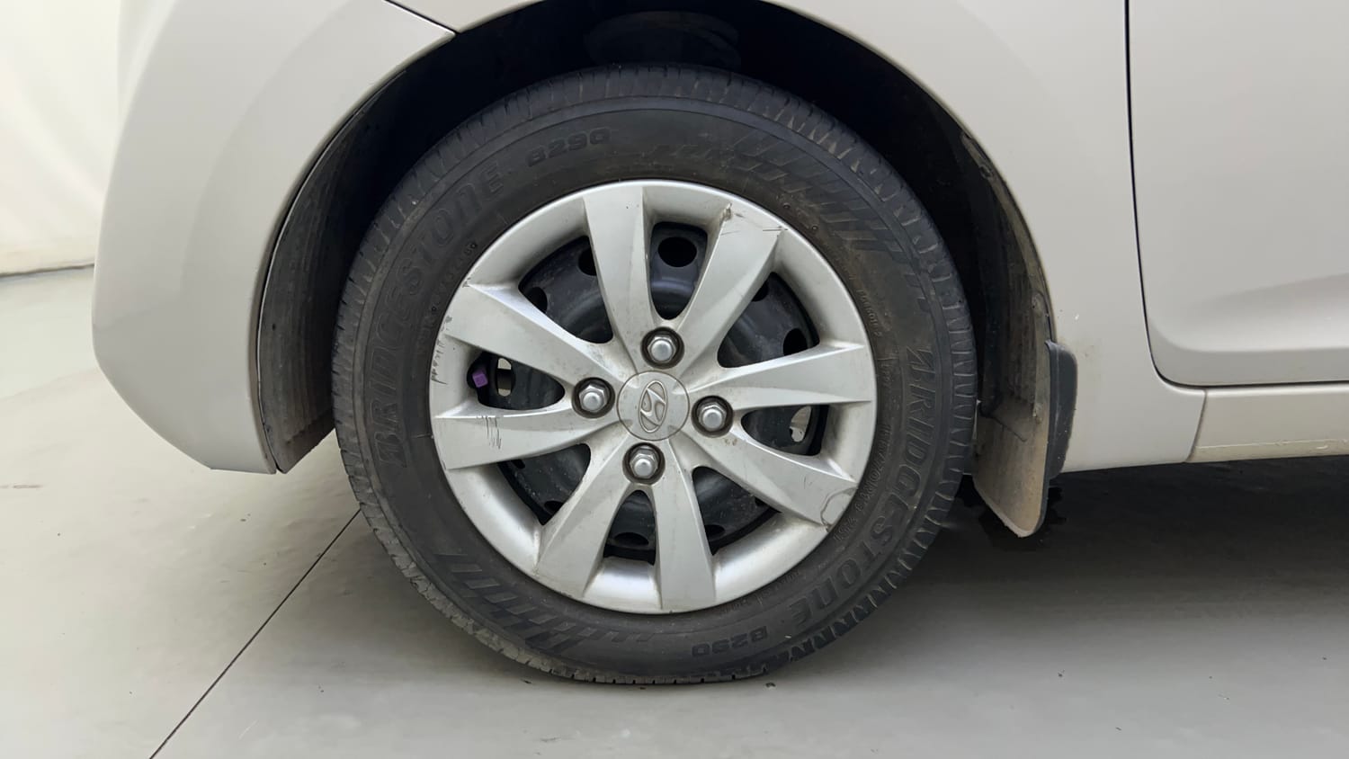 Used 2011 Hyundai Eon Sportz Petrol Manual tyres LEFT FRONT TYRE RIM VIEW