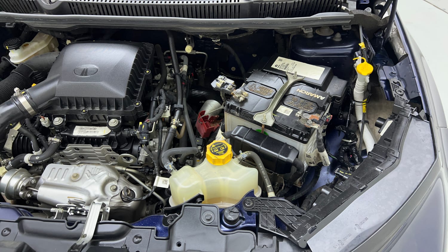 Used 2025 Tata Curvv Pure Plus S 1.2 Revotron Petrol 7DCA Petrol Automatic engine ENGINE LEFT SIDE VIEW