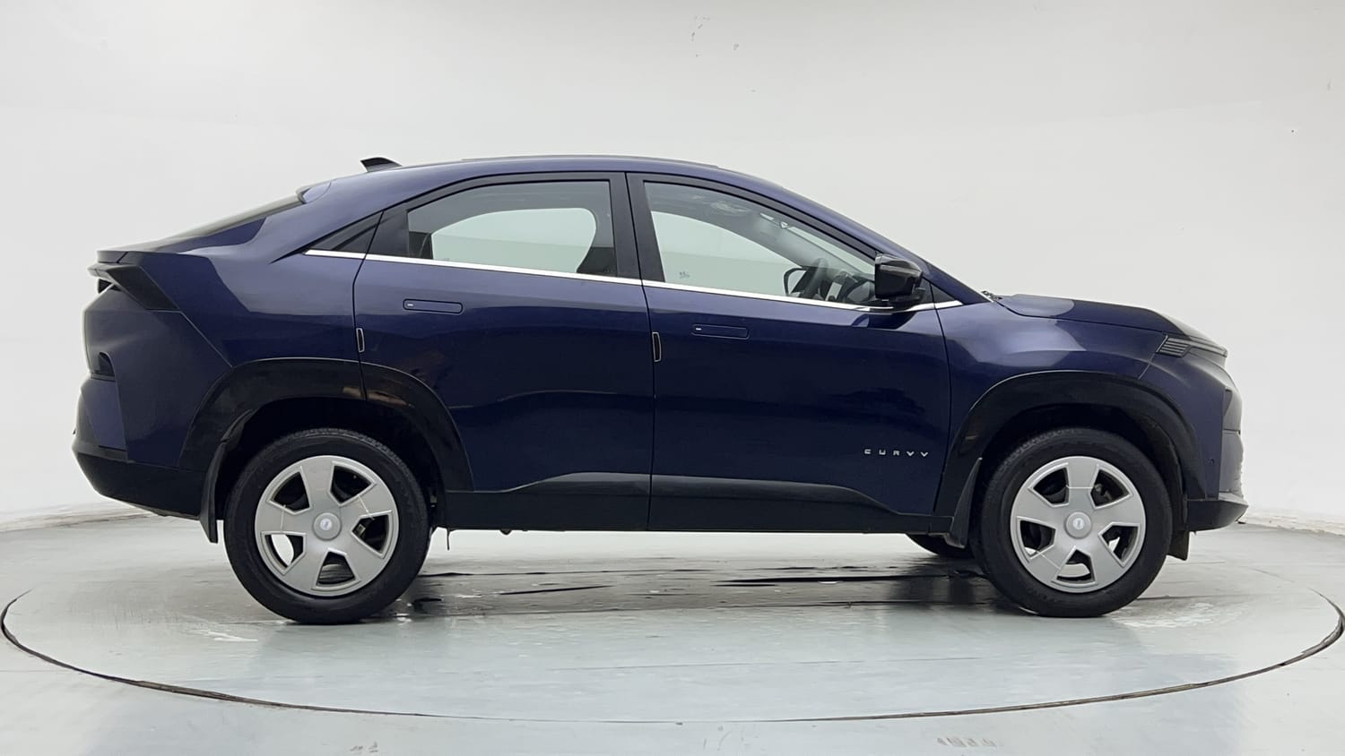 Used 2025 Tata Curvv Pure Plus S 1.2 Revotron Petrol 7DCA Petrol Automatic exterior RIGHT SIDE VIEW