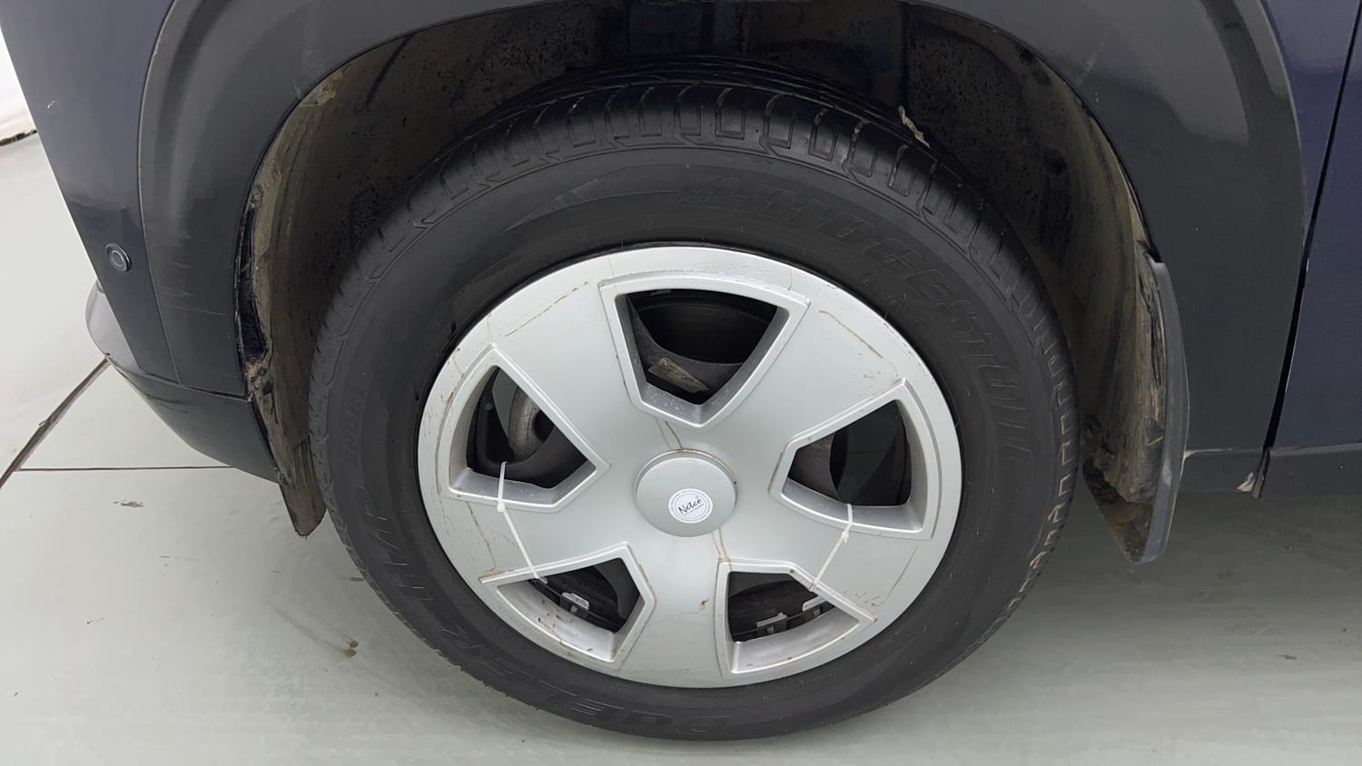 Used 2025 Tata Curvv Pure Plus S 1.2 Revotron Petrol 7DCA Petrol Automatic tyres LEFT FRONT TYRE RIM VIEW
