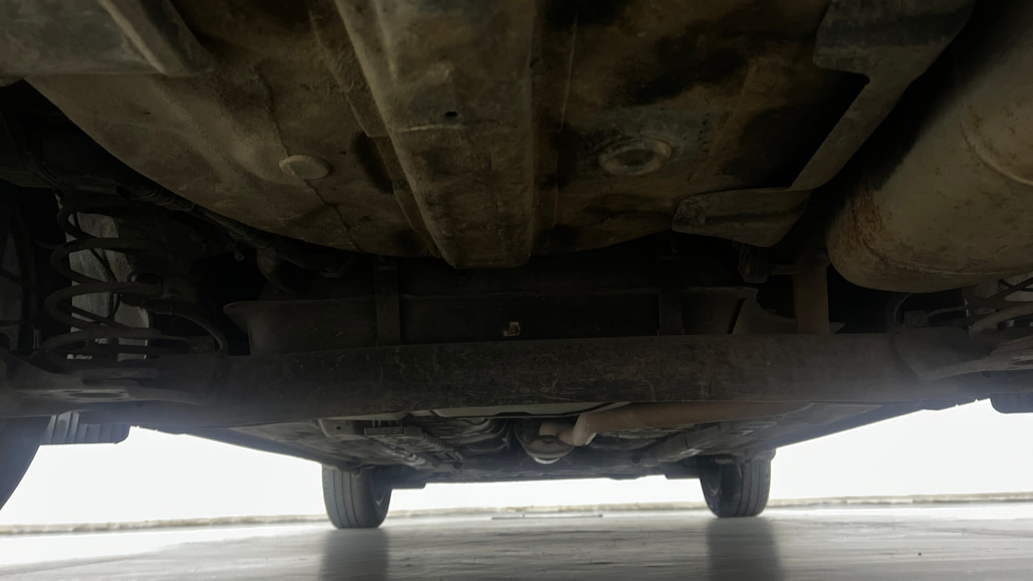 Used 2021 Hyundai Aura SX Plus 1.0 Petrol Petrol Manual extra REAR UNDERBODY VIEW (TAKEN FROM REAR)