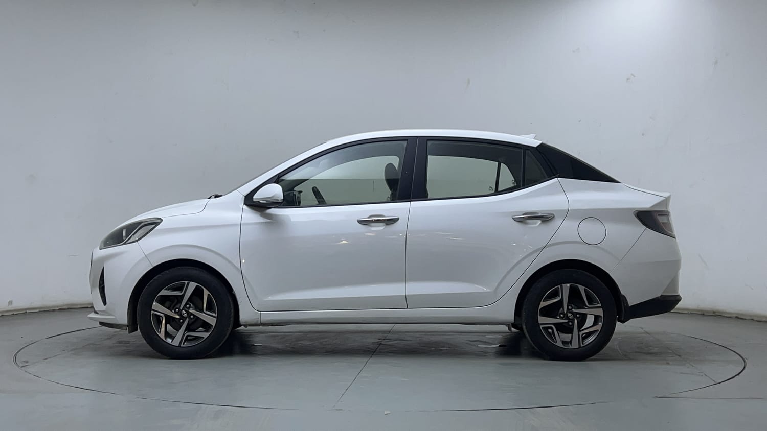Used 2021 Hyundai Aura SX Plus 1.0 Petrol Petrol Manual exterior LEFT SIDE VIEW