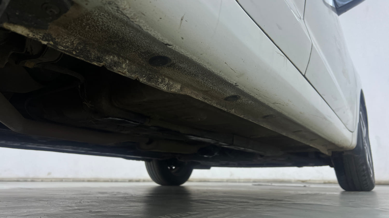 Used 2021 Hyundai Aura SX Plus 1.0 Petrol Petrol Manual extra REAR RIGHT UNDERBODY VIEW