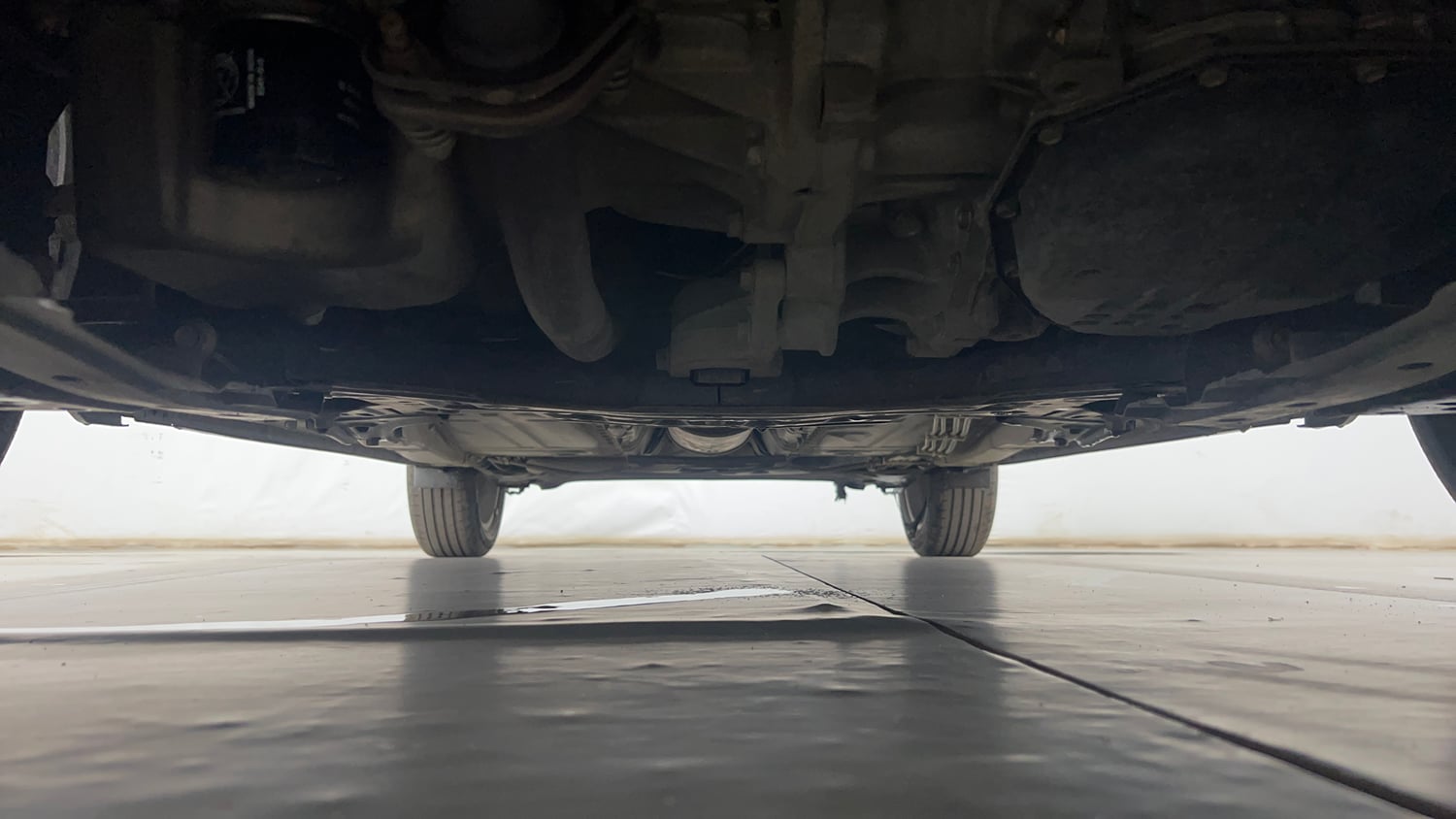 Used 2019 Maruti Suzuki Baleno Zeta 1.2 AT Petrol Automatic extra FRONT LEFT UNDERBODY VIEW