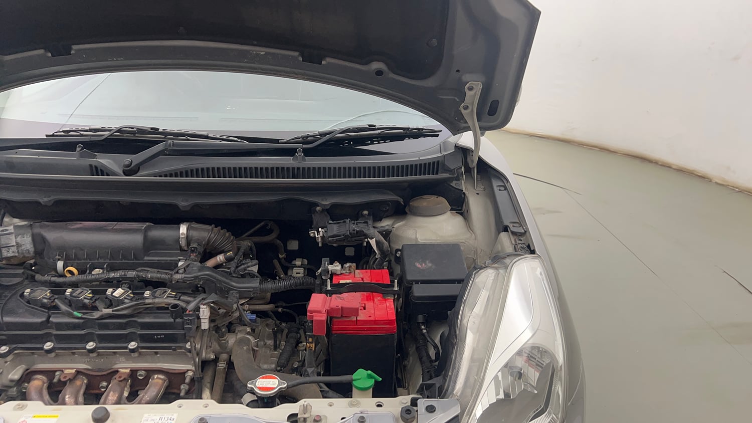 Used 2019 Maruti Suzuki Baleno Zeta 1.2 AT Petrol Automatic engine ENGINE LEFT SIDE HINGE & APRON VIEW