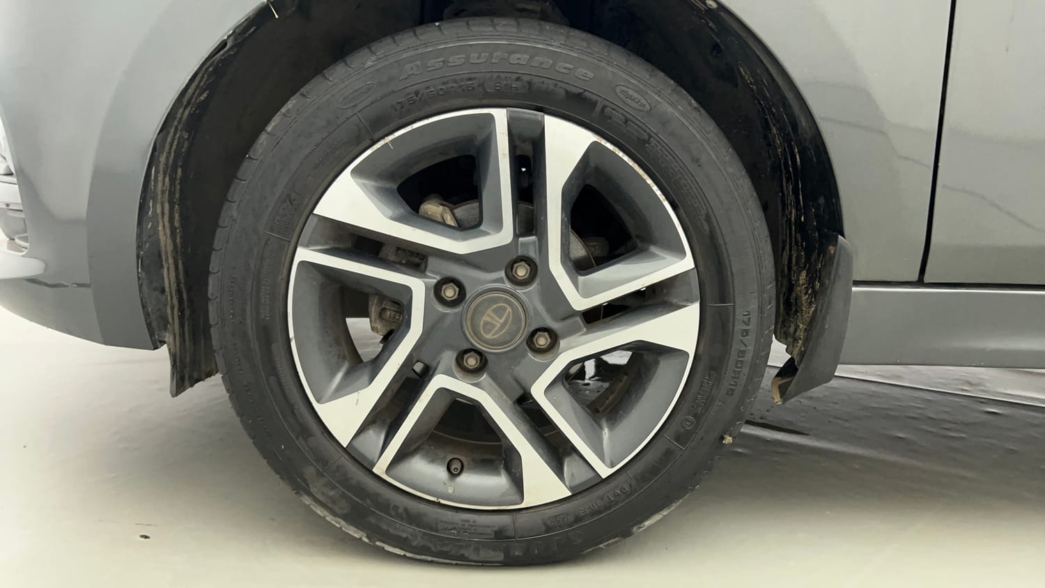 Used 2021 Tata Tiago XZ Plus Petrol Manual tyres LEFT FRONT TYRE RIM VIEW