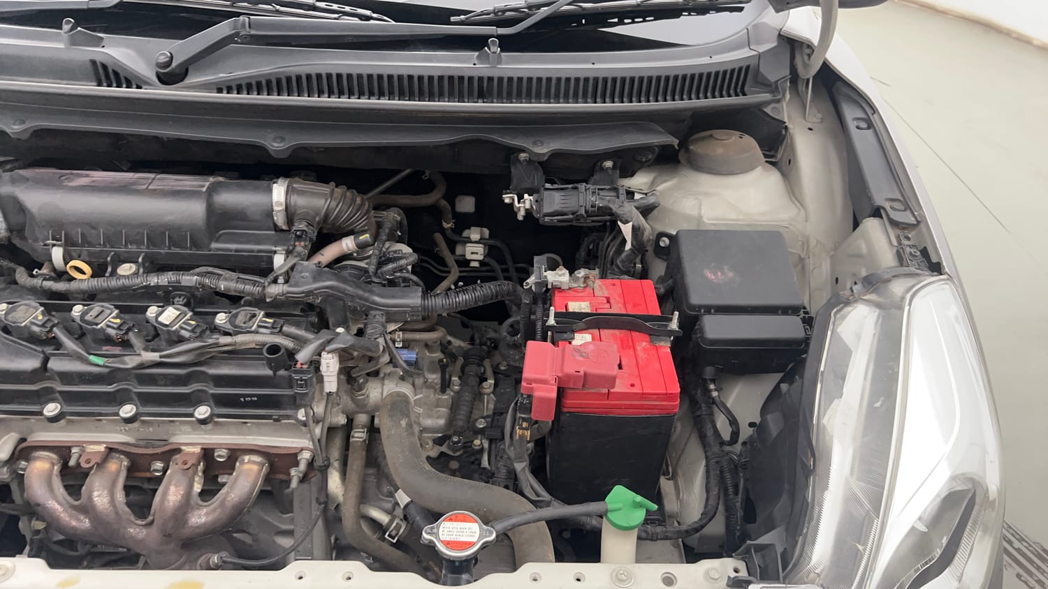 Used 2019 Maruti Suzuki Baleno Zeta 1.2 AT Petrol Automatic engine ENGINE LEFT SIDE VIEW