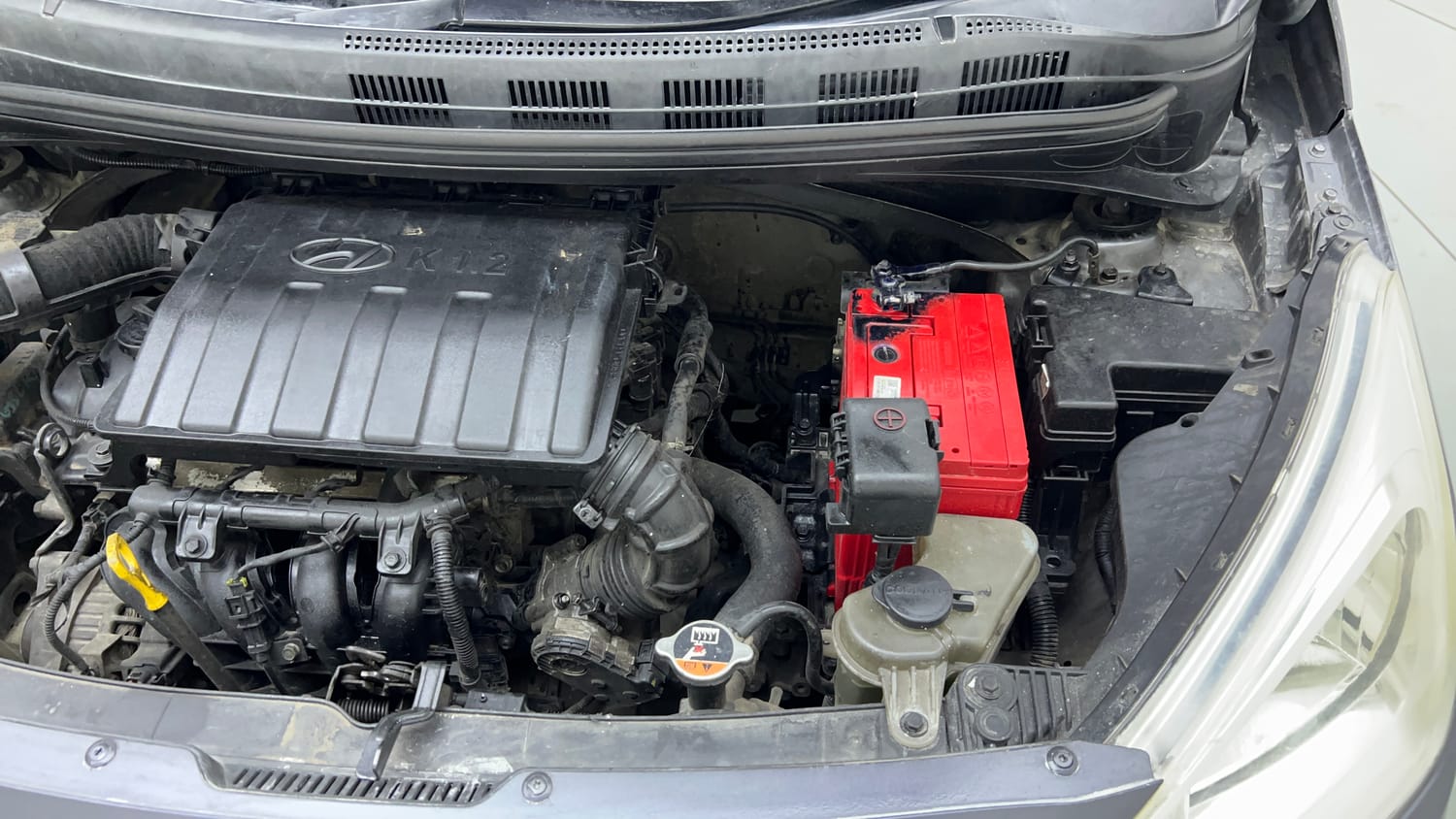 Used 2014 Hyundai Grand i10 Sportz 1.2 Kappa VTVT Petrol Manual engine ENGINE LEFT SIDE VIEW