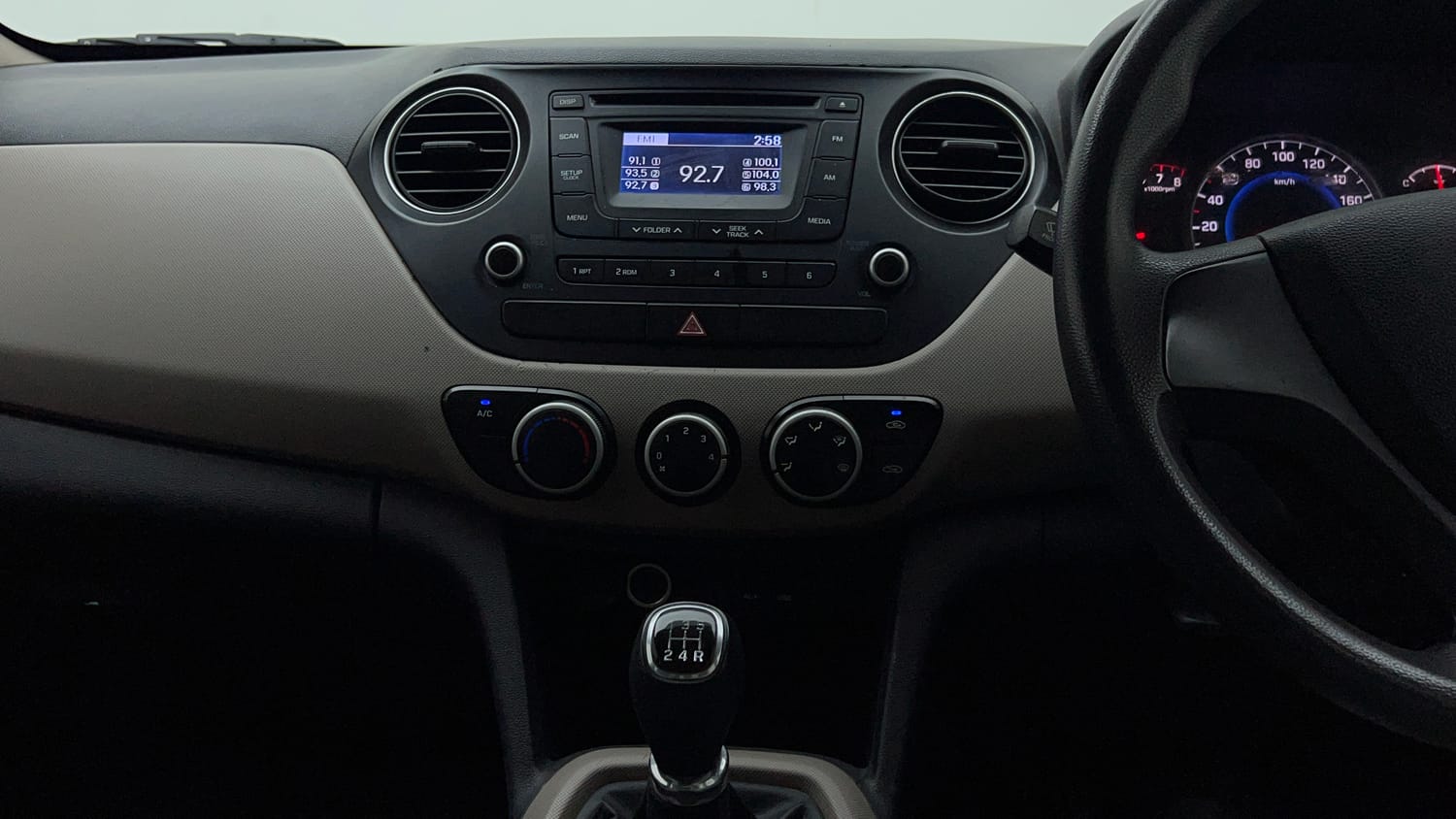 Used 2014 Hyundai Grand i10 Sportz 1.2 Kappa VTVT Petrol Manual interior MUSIC SYSTEM & AC CONTROL VIEW