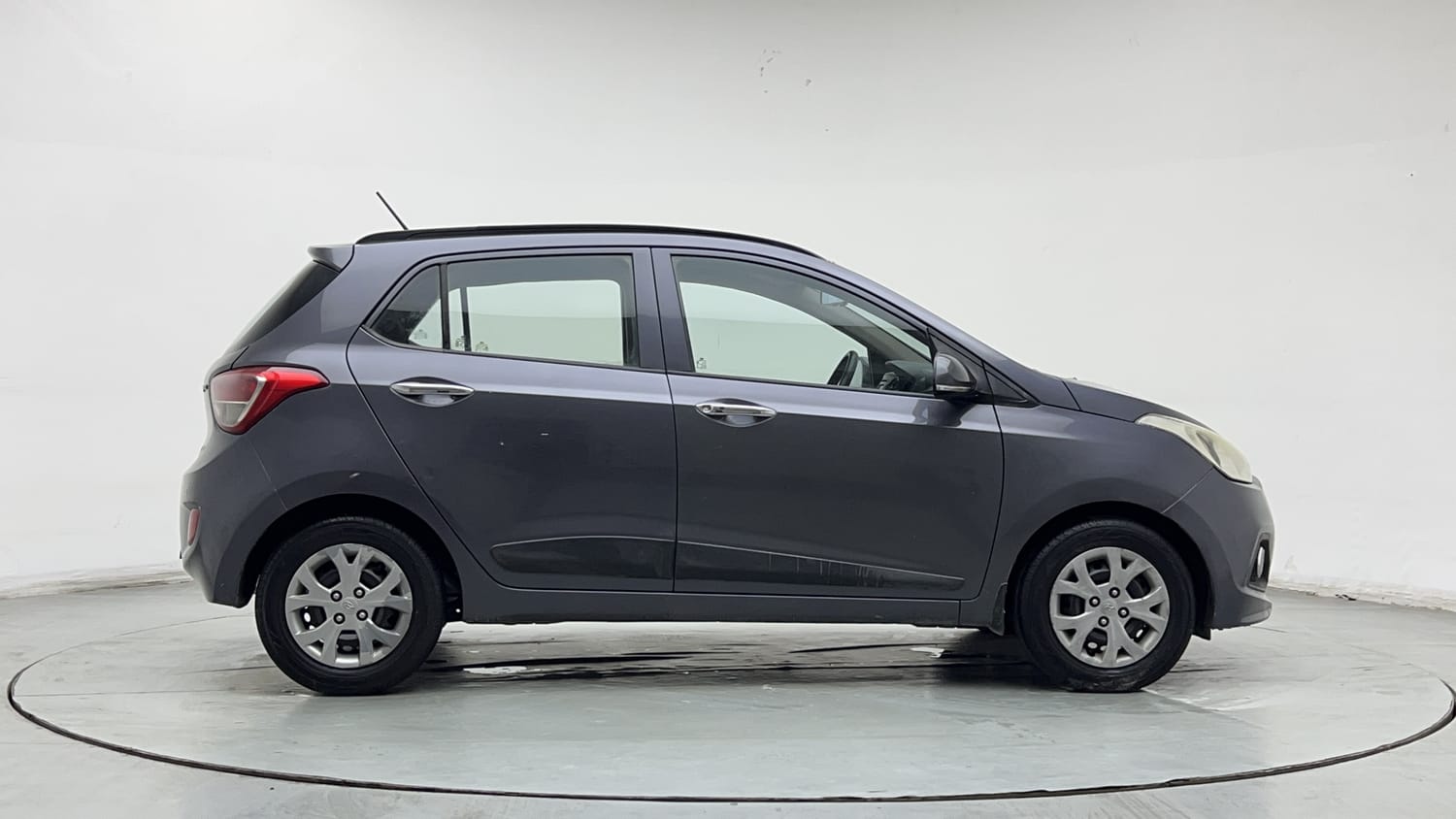 Used 2014 Hyundai Grand i10 Sportz 1.2 Kappa VTVT Petrol Manual exterior RIGHT SIDE VIEW