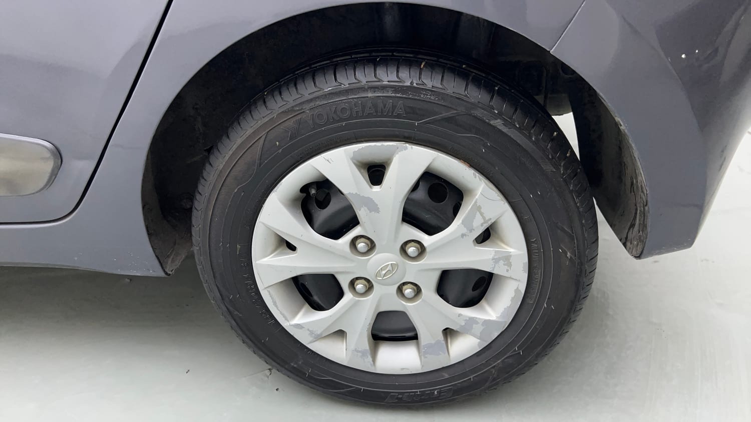 Used 2014 Hyundai Grand i10 Sportz 1.2 Kappa VTVT Petrol Manual tyres LEFT REAR TYRE RIM VIEW