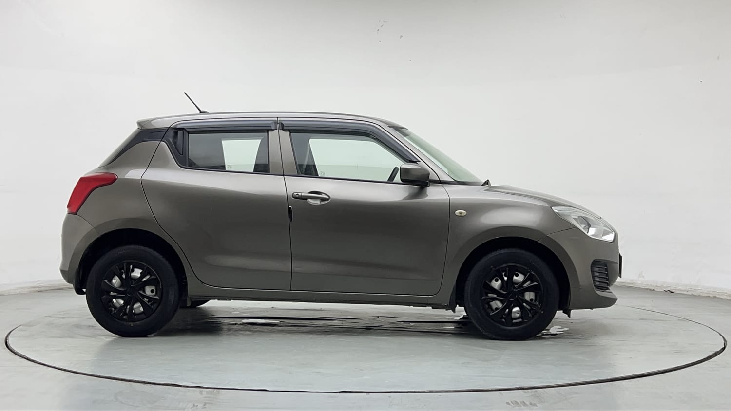 Used 2019 Maruti Suzuki Swift LXi Petrol Manual exterior RIGHT SIDE VIEW