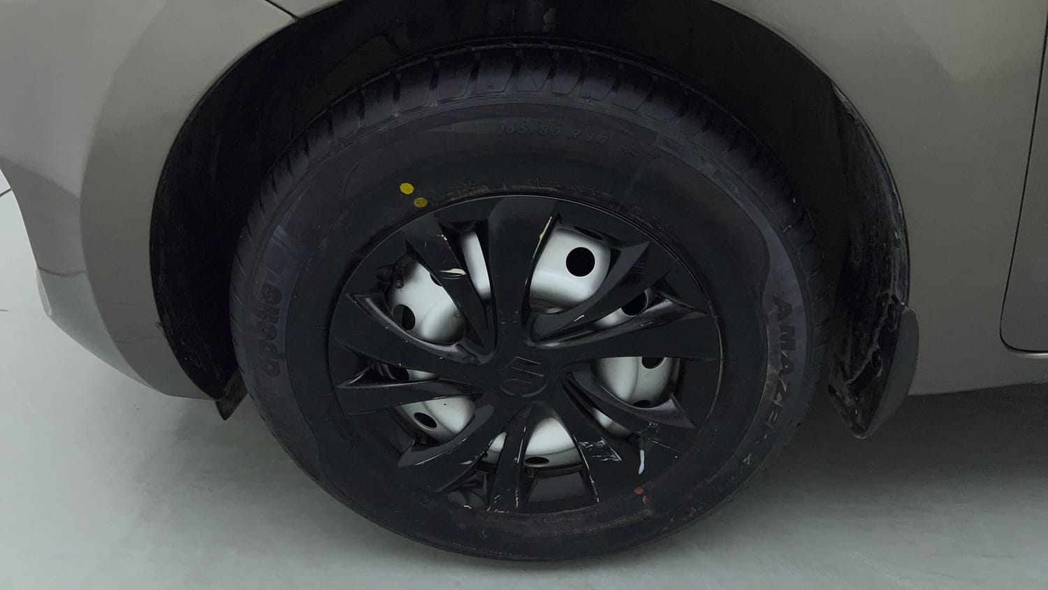 Used 2019 Maruti Suzuki Swift LXi Petrol Manual tyres LEFT FRONT TYRE RIM VIEW