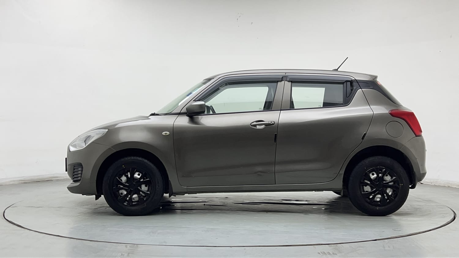 Used 2019 Maruti Suzuki Swift LXi Petrol Manual exterior LEFT SIDE VIEW