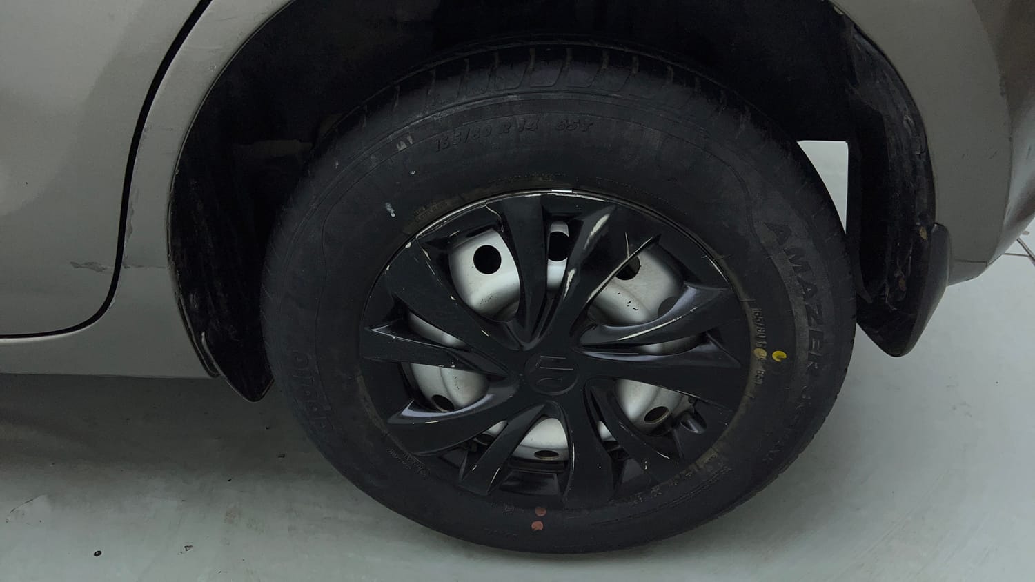 Used 2019 Maruti Suzuki Swift LXi Petrol Manual tyres LEFT REAR TYRE RIM VIEW